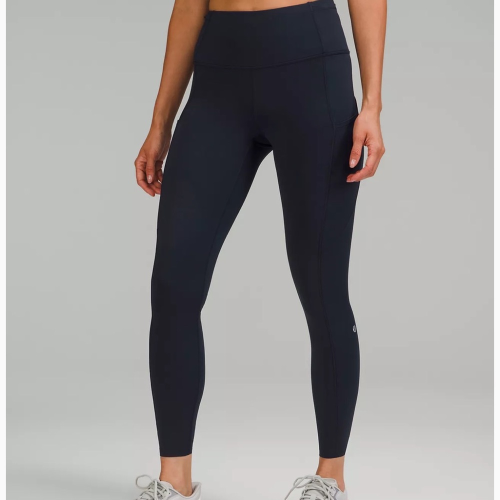 Lululemon fast and free navy leggings 25” inseam, size 4